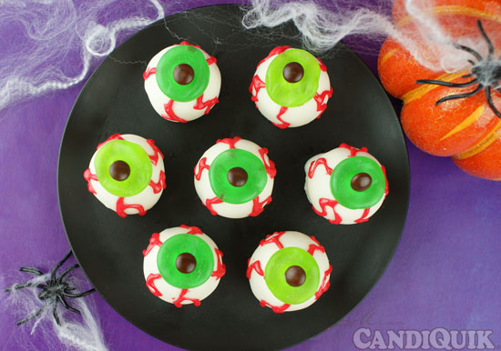 Eyeball Cake Balls - perfect for any Halloween party! blog.candiquik.com